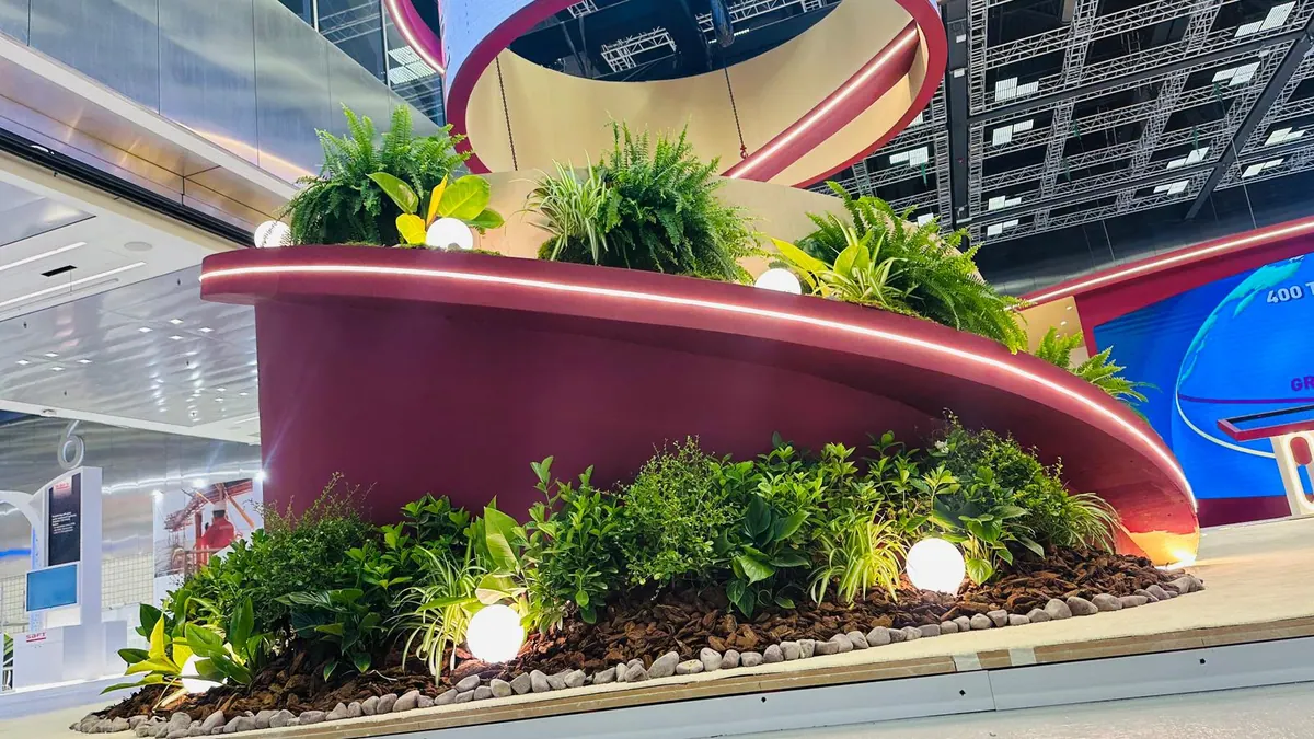 Nakilat stand with a spiral garden